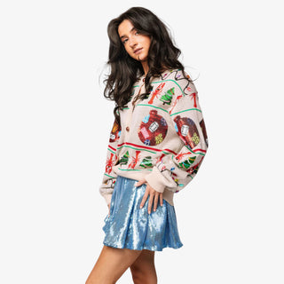Model wearing Queen of Sparkles Cajun Christmas Sweater with sequin crawfish and tree details