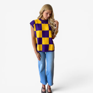 Purple and gold checkered game day sweater top styled with cropped wide leg jeans and black flats, full front view