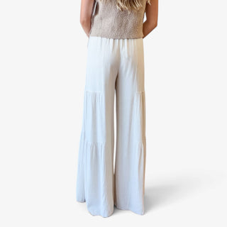 Coastal Linen Palazzo Pants in white with flowing wide legs, tiered panels and relaxed fit, full back view for women