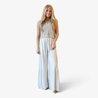 Coastal Linen Palazzo Pants in white with flowing wide legs and tiered design styled with a neutral top, full front view