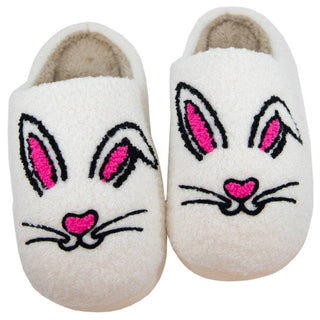 White bunny face plush slippers with embroidered pink ears and nose, cozy faux fur lining, and slip-on design perfect for Easter lounging