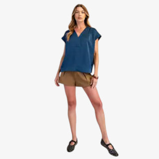 Deep teal satin v-neck blouse with short sleeves and relaxed fit