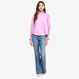 pink button down blouse pleated sleeve ruffle neck front view styled with jeans