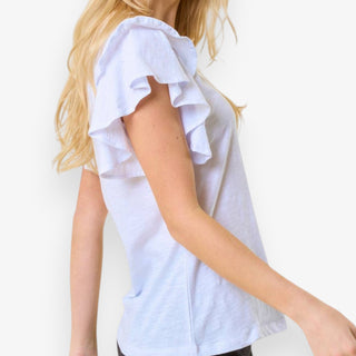Side view of white ruffle sleeve tee with flutter sleeves, soft lightweight fabric, and a relaxed fit showing drape and silhouette