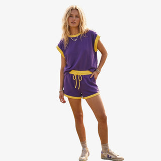 Purple and gold scuba game day set with cap sleeve top and drawstring shorts front view