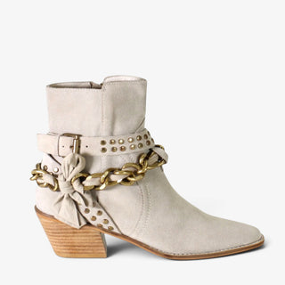 Diba True Paper Lily light taupe suede ankle boot with gold chain, studded straps and bow, side view