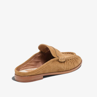 Dolce Vita Betzy light brown suede loafer mule showing open back and cushioned footbed, rear angled view
