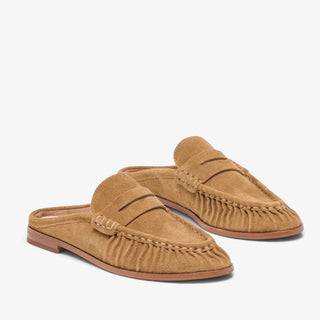 Dolce Vita Betzy light brown suede loafer mules with penny strap and ruched moccasin detail, pair front angled view