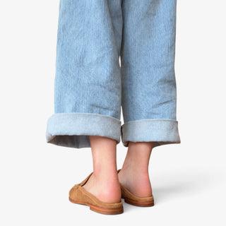 Dolce Vita Betzy suede loafer mule in camel shown from the back with open heel and low stacked sole.