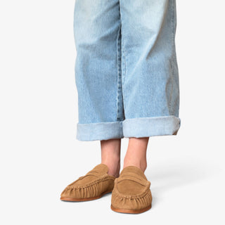 Dolce Vita Betzy suede loafer mule in camel shown from the front with penny loafer strap and ruched moccasin toe.