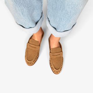  Dolce Vita Betzy suede loafer mule in camel shown from above with ruched moccasin stitching and penny loafer detail.