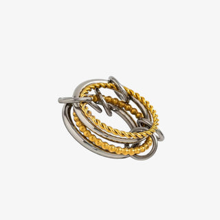 Gold and silver mixed metal interlocking ring set with beaded and twisted textures