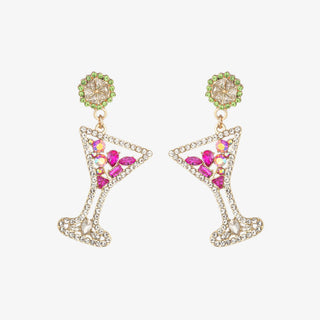 Pair of star-shaped earrings with pink and green gemstones on a white background