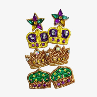 Colorful beaded earrings with star and crown designs on a white background