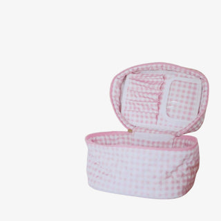 Pink plaid quilted makeup bag with zip closure and interior pocket