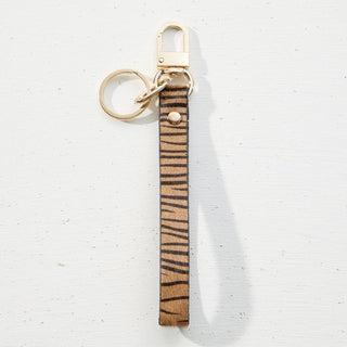 Genuine Leather Wristlet Keychain with gold hardware and animal print design