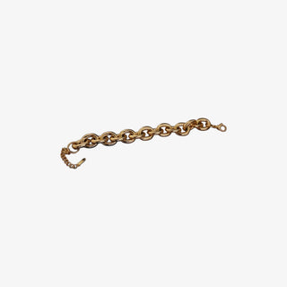 Gold chain bracelet on a white background