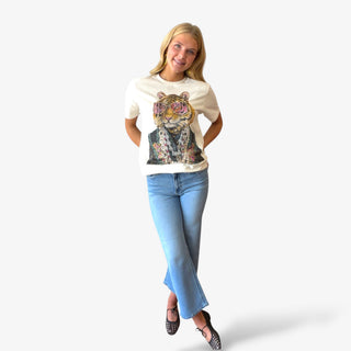 funky tiger tee styled with light wash jeans and black flats for casual boutique outfit front view