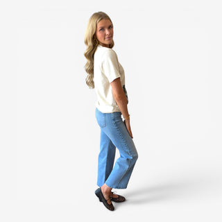 funky tiger tee styled with jeans and black flats showing relaxed fit side view