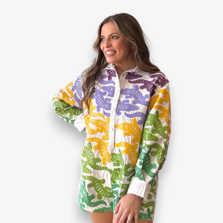 Vibrant alligator-print romper with Queen of Sparkles’ signature bold detailing made for game day fun and standout style.