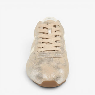 J/Slides Peggy metallic gold women’s sneaker with tonal laces and rounded toe, shown from the front.