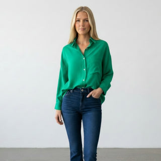 Kelly green button down blouse front view featuring a collared neckline, button-front closure, long sleeves, and an easy relaxed fit.