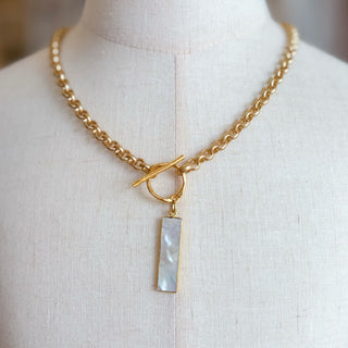 Kitzi Mother of Pearl Bar Necklace with gold chain, front toggle closure and rectangular mother of pearl pendant, front product view