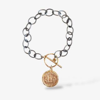 Kitzi Victoria mixed metal coin bracelet with silver-tone chain, gold toggle closure and round gold coin charm, front product view