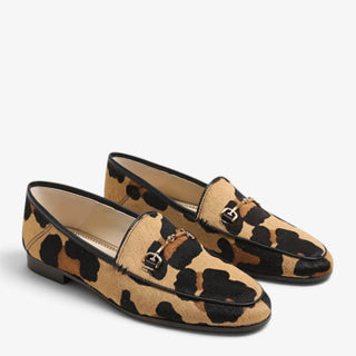 Sam Edelman Loraine leopard print Brahma hair loafers with gold bit hardware shown as a pair at an angle