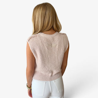 Champagne Marlow button knit top with textured knit fabric, sleeveless cut and relaxed fit, back view.