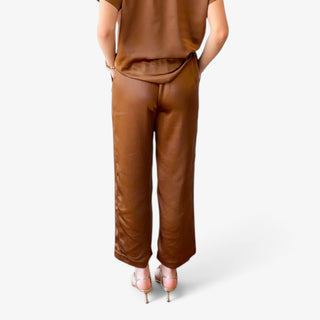 Melissa Nepton Colette Satin Pant in chestnut showing relaxed wide leg fit and satin finish, back view