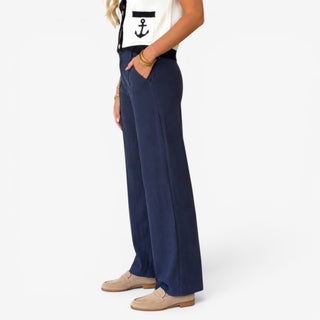 Michael Stars April linen trouser in Nocturnal navy showing the relaxed wide leg and side slit pocket, side view