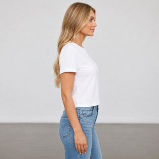 Michael Stars Jackie Tee White crew neck T-shirt with short rolled sleeves and waist-length hem, side profile view