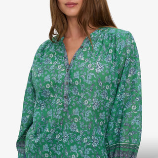 Close-up of Michael Stars Katarina green floral popover top showing the blue floral print, button neckline and contrast trim details