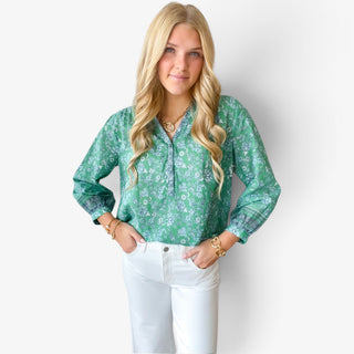     Michael Stars Katarina green floral printed popover top front view styled with white jeans for an elevated everyday look.