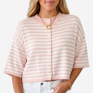 Natalia pink and white stripe loose knit top close-up front view showing ribbed neckline and button-front detail.