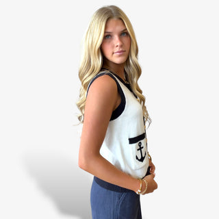 Ivory nautical sleeveless knit vest with navy contrast trim and anchor pocket detail, side view