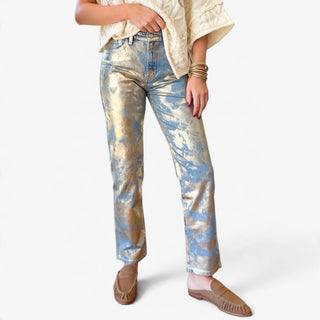 Nerissa gold metallic straight leg jeans showing a shimmering foil finish, button closure, belt loops and classic five-pocket styling, front detail view.