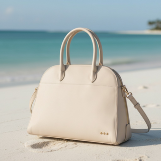 Oat nubuck tote bag on beach with coastal vacation styling
