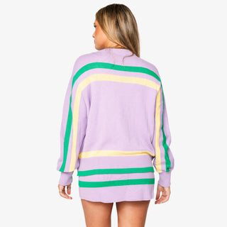 Queen of Sparkles lilac Queen Cake striped Mardi Gras sweater with sequin graphic and green and yellow trim.