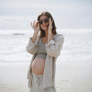 Oversized oatmeal linen shirt with relaxed fit coastal ocean lifestyle view