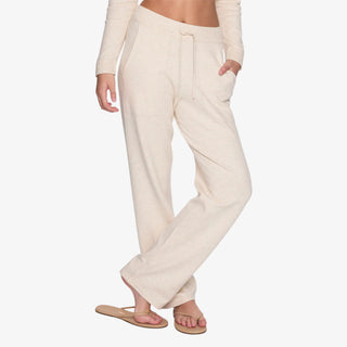 Cream sweater-knit lounge pant with relaxed straight-leg fit and elastic drawstring waistband.