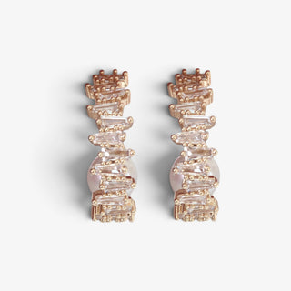 Gold pearl crystal hoop earrings featuring curved rows of white baguette crystals and center pearl, front vire