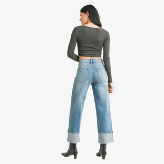 Petite high-rise slim wide leg jeans with bold cuffed hem and relaxed leg fit.