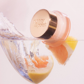 Poppy & Pout Pink Grapefruit moisturizing lip mask for overnight hydration, front product view with glass jar and floral box