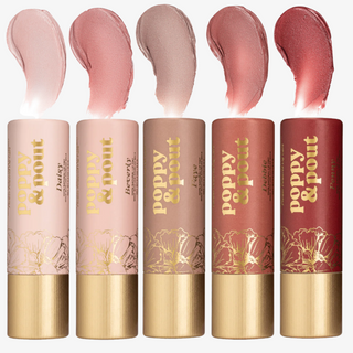 Poppy & Pout natural lip tints in five shades with coordinating color swatches, displayed in floral tubes with gold caps on a white background.