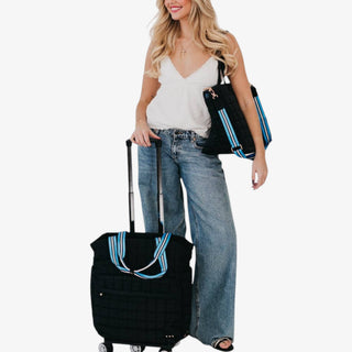 Jetsetter Quilted Rolling Tote in black with quilted design, dual handles, and telescopic handle on wheels.