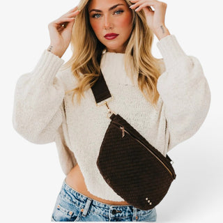 Pretty Simple Westlyn chocolate vegan suede bum bag worn crossbody with woven texture, gold zipper hardware and adjustable strap.