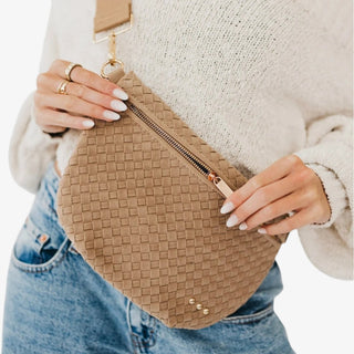 Pretty Simple Westlyn taupe vegan suede bum bag worn crossbody with woven texture, gold zipper hardware and adjustable strap.