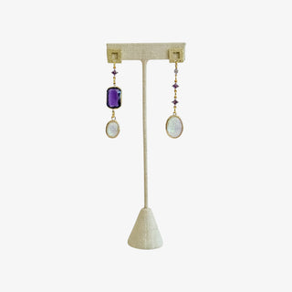 Asymmetrical gold dangle earrings featuring purple amethyst and opal-style stones for a chic, modern, and elegant statement look.